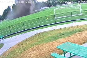 A massive sinkhole opened up and swallowed a light pole in the middle of a football pitch at Gordon Moore Park in Alton, Illinois, USA.