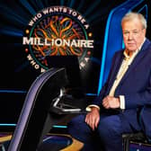 Jeremy Clarkson, sat in the host’s chair on set of Who Wants to be a Millionaire? (Credit: Stellify Media)