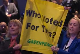 Protestors heckle Prime Minister Liz Truss during her keynote speech at the Conservative Party Conference 2022 in Birmingham.