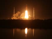 Artemis I Space Launch System (SLS) rocket, with the Orion capsule attached, launches at NASA's Kennedy Space Center on November 16