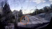 The video shows a man just inches from being hit by the speeding train.