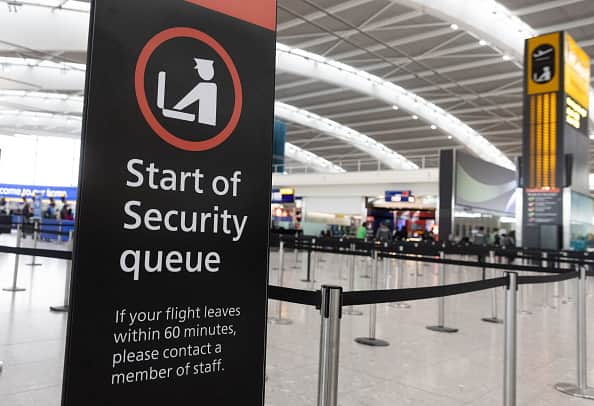 A sign indicating the start of the security queue during a strike by security workers at London Heathrow Airport in London, UK, on Friday, March 31, 2023. IAG SAsÂ British AirwaysÂ is set to scrap 320 flights during the Easter week as security workers strike for 10-days over pay. Photographer: Chris Ratcliffe/Bloomberg via Getty Images