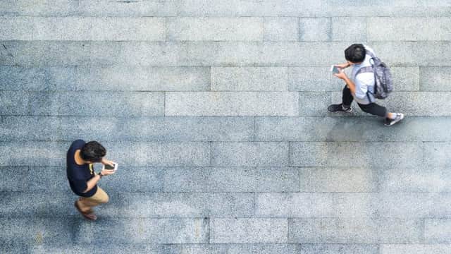 Award-winning children’s newspaper First News is warning young people about the dangers of crossing the road while using their mobile phones (Adobe)
