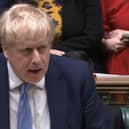 Prime Minister Boris Johnson delivers a statement to MPs in the House of Commons on the Sue Gray report (PA)