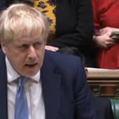 Prime Minister Boris Johnson delivers a statement to MPs in the House of Commons on the Sue Gray report (PA)