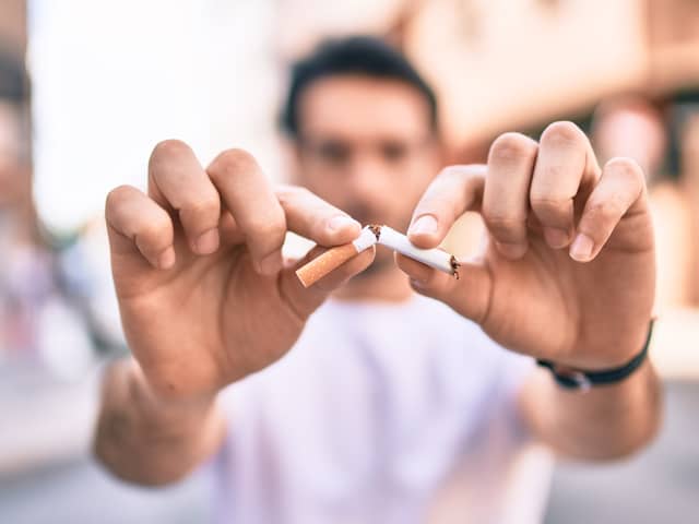 Smokers spend enough on cigarettes in their lifetime to afford four brand new family cars (SWNS)