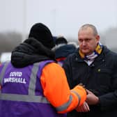 Fans have their Covid-19 passes checked as they arrive at the stadium prior to the Premier League match between Leeds United and Arsenal (Photo: Getty)