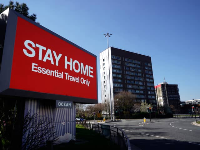 A giant television over the A57 Motorway urges people to stay home on March 26, 2020 in Manchester, England. (Getty Images)