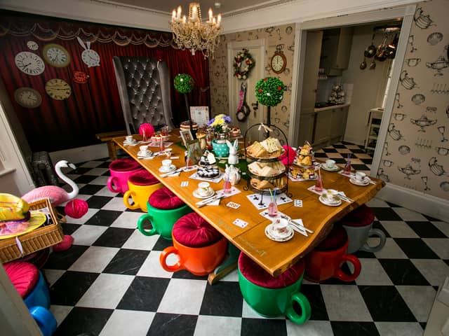 Inside one of UK’s oldest homes transformed into Alice in Wonderland rental with teacup stools & teapot taps