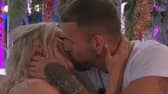 Molly Marsh and Zachariah Noble share a kiss during Love Island’s ninth episode.