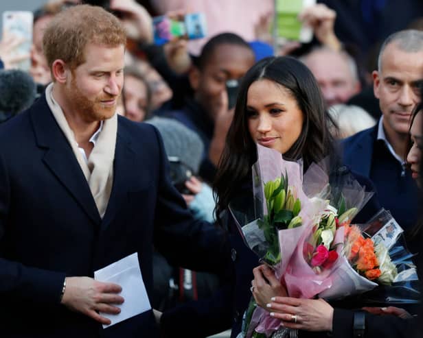 Prince Harry and his then-fiancee, now wife, US actress Meghan Markle arrive to visit the Terrence Higgins Trust World AIDS Day charity fair at Nottingham Contemporary on December 1, 2017