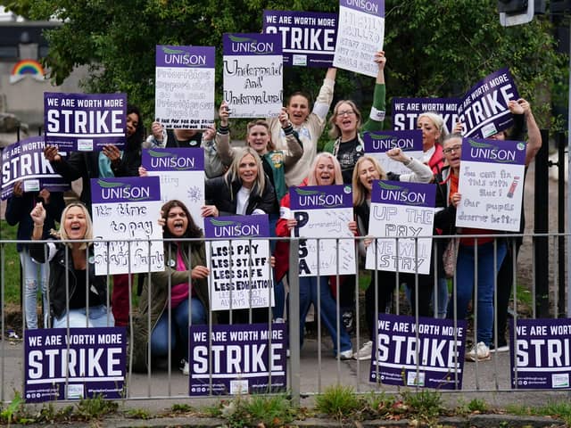 School support workers, cleaning staff and janitors are currently on strike in Scotland as the Unison union remains locked in a pay dispute with education chiefs. (Credit: Jane Barlow/PA Wire)