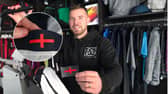 Director Grant Walters at The Sports Shop in Kingswinford show off their St George's Cross transfer to apply to new England kit. A sports shop is selling St George’s Cross iron-on transfers for £4.95 - so fans can cover the controversial design on the new England football shirt. 