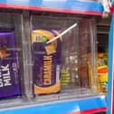 Numerous products are being kept in security boxes at supermarkets - including £2 chocolate bars (Photo: James Linsell Clark/SWNS)