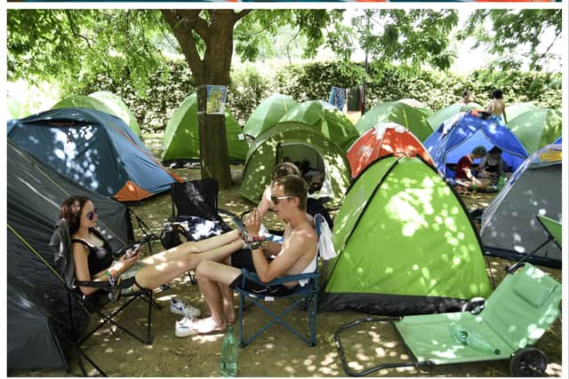 Here are 6 top tips from our experts on how to stay healthy at Glastonbury Festival. (Photo: Leon Neal/Getty Images, NENAD MIHAJLOVIC/AFP via Getty Images)