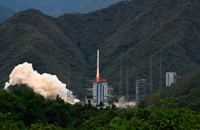 A rocket successfully lifts off from a space base in Xichang, in China's southwestern Sichuan province on June 22, 2024. (Photo by ADEK BERRY/AFP via Getty Images)