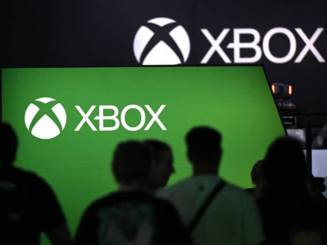 Visitors stand at the Xbox booth at the Gamescom video game fair in Cologne, Germany in August 2023 (Photo: INA FASSBENDER/AFP via Getty Images)