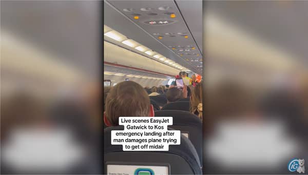 Man taken off plane after ‘trying to storm cockpit at 30,000ft’.