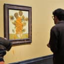 Just Stop Oil throw soup over Van Gogh's Sunflowers for second time.