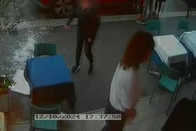 Video grab from this shocking footage shows an alleged attack on restaurant staff - in a dispute over paying a bill  at La Bella Vista in Hastings, East Sussex.