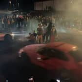 Video shows a man drifting then crashing with parked cars as well as injuring a member of the public.