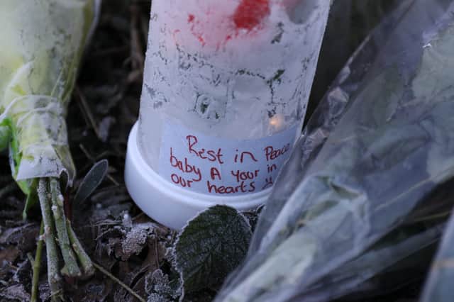 Tributes to 'Baby A' left by members of the public.