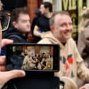 Chris McCausland poses for selfies outside Blackpool Tower during Strictly Come Dancing visit.