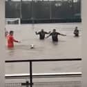 Lydney Town AFC players swim in flooded pitch