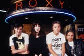 Stephen Morris, Gillian Gilbert, Bernard Sumner, and Peter Hook, of the band New Order, at the Roxy, London, 1986. 