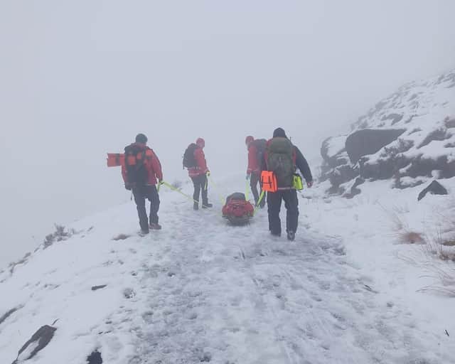 Injured man rescued from snow-covered mountain