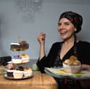 Photo of business owner with vegan cupcakes