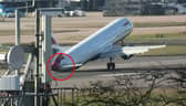Tail of British Airways jet hits runway during aborted landing.