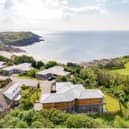 The Gower Peninsula in Swansea is one of the best places to live in the UK, according to the Sunday Times. This fabulous four-bedroom house looks out over Langland Bay, with its lovely sunny beach, and the nearby golf course.