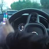 Disqualified driver jumps from moving car during police chase.