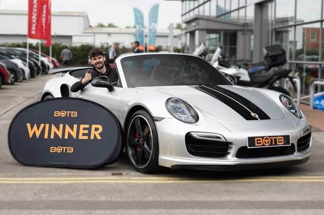 Tony was cheered by his colleagues as he marvelled at his new motor