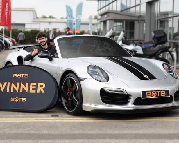 Tony was cheered by his colleagues as he marvelled at his new motor