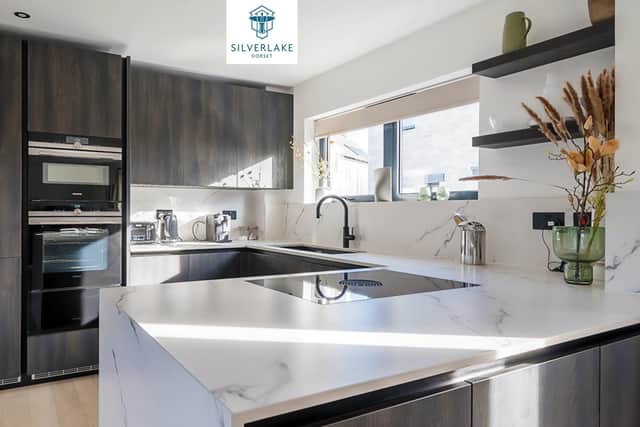 The kitchen is fully fitted, with built-in appliances included in the prize