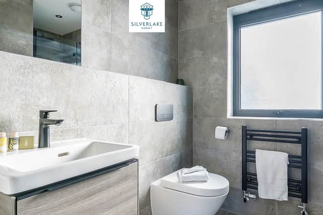 The family bathroom is fitted with high-end materials