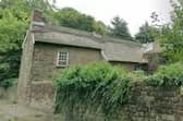 Applications for planning permission and listed building consent to replace the thatched roof with grey slate tiles on Coldwell Cottage, Southgate, Eckington have not yet been determined by North East Derbyshire District Council. 