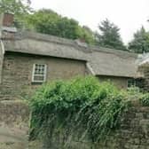 Applications for planning permission and listed building consent to replace the thatched roof with grey slate tiles on Coldwell Cottage, Southgate, Eckington have not yet been determined by North East Derbyshire District Council. 