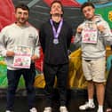 Alex Greensmith, Charles Edwards, Lewis Moore and Amber McCord from High Peak Comps want to fundraise £1000 for a High Peak foodbank.