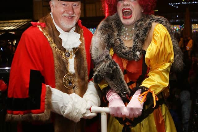 High Peak Mayor Ed Kelly and panto star James Holmes turn on tyhe lights