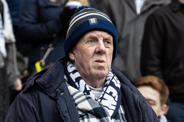 A PNE fan keeps out the Humberside chill with a hat and scarf
