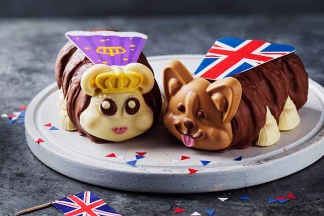 Connie has been given the royal treatment with a makeover fit for a Queen with her corgi pal who is adorned with a Union Jack cape
