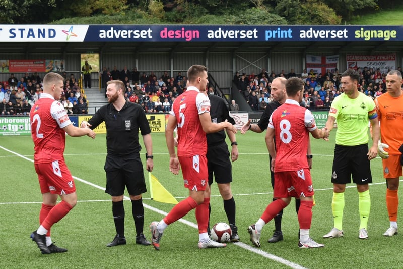 The players shake hands before kick-off

Photo by Morgan Exley