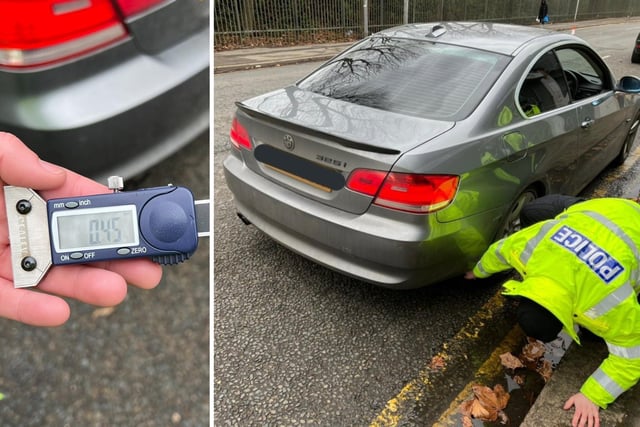 A BMW pulled over for illegal number plates and dark windows was found to have low tread on two tyres