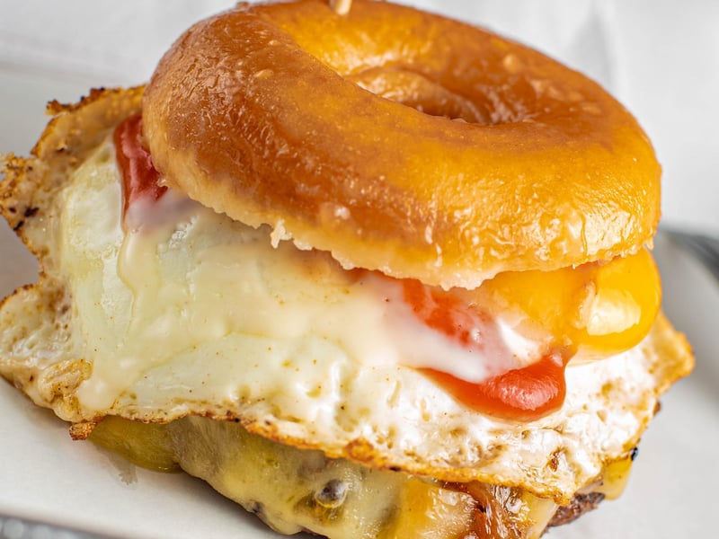 Grizzpy kreme burger - in a glazed ring donut - at Grizzlers
