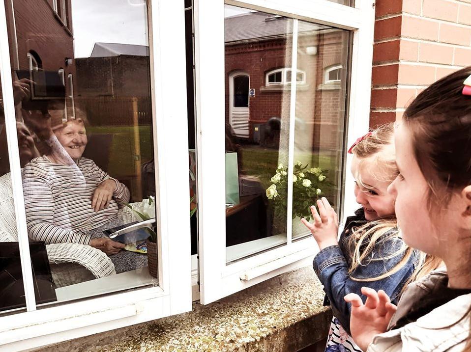 Lyndsey Brennan: "Outside waving into our Nana".