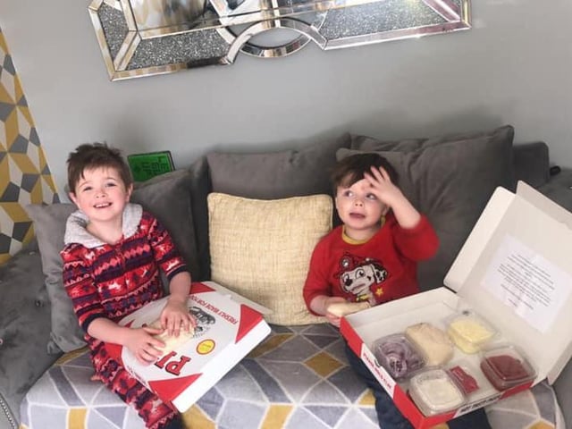 Natalie McLaughlin: "My two boys making their own pizzas".
