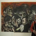 Laura Hyland with her latest piece Remembering Grenfell which will be on display at the Green Man Gallery this weekend.